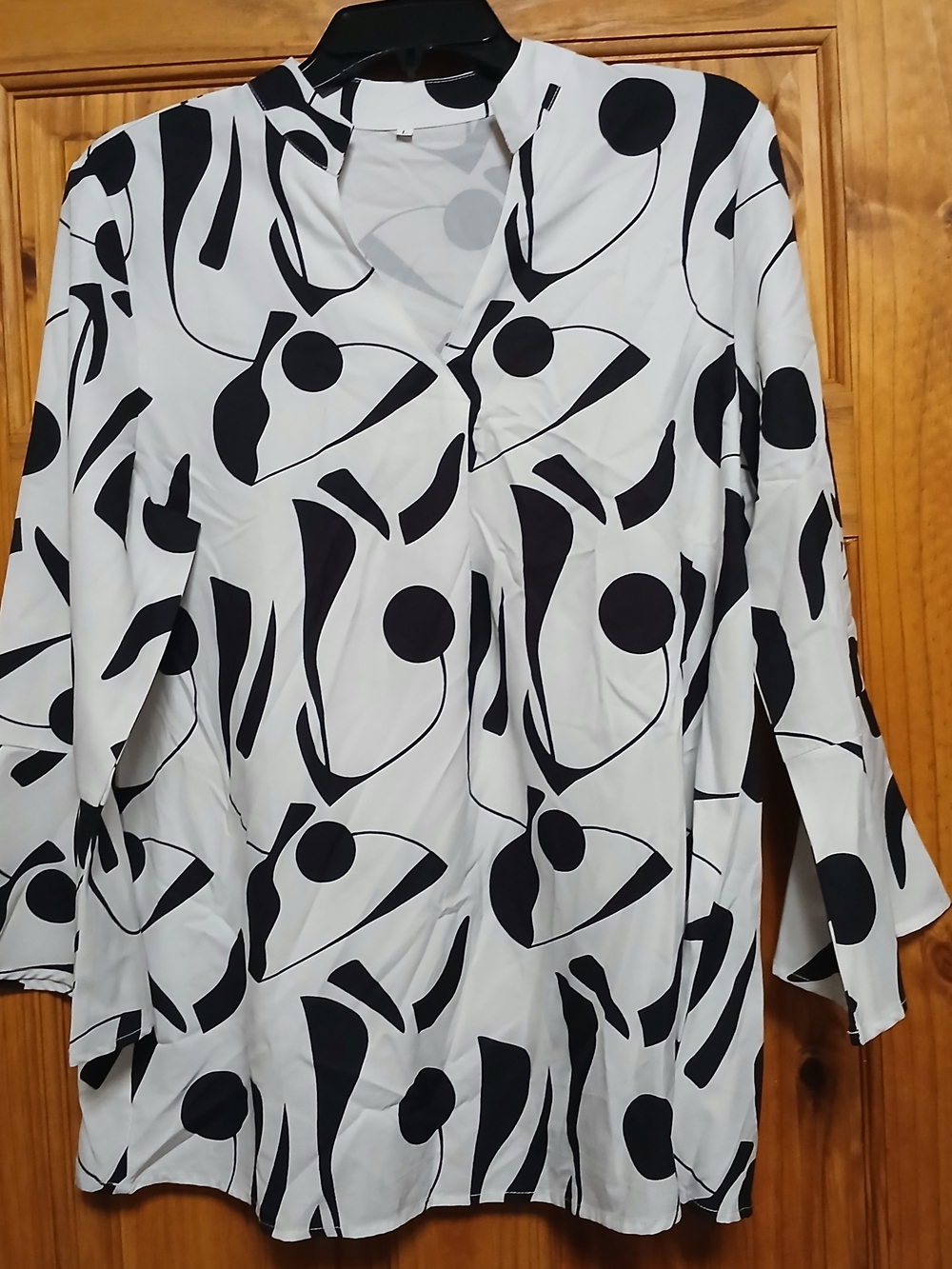 Black & White Abstract V-Neck Blouse